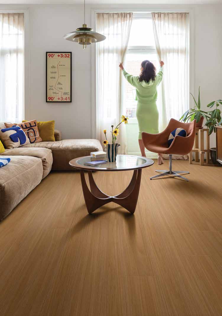 Sala aconchegante com piso laminado Quick-Step